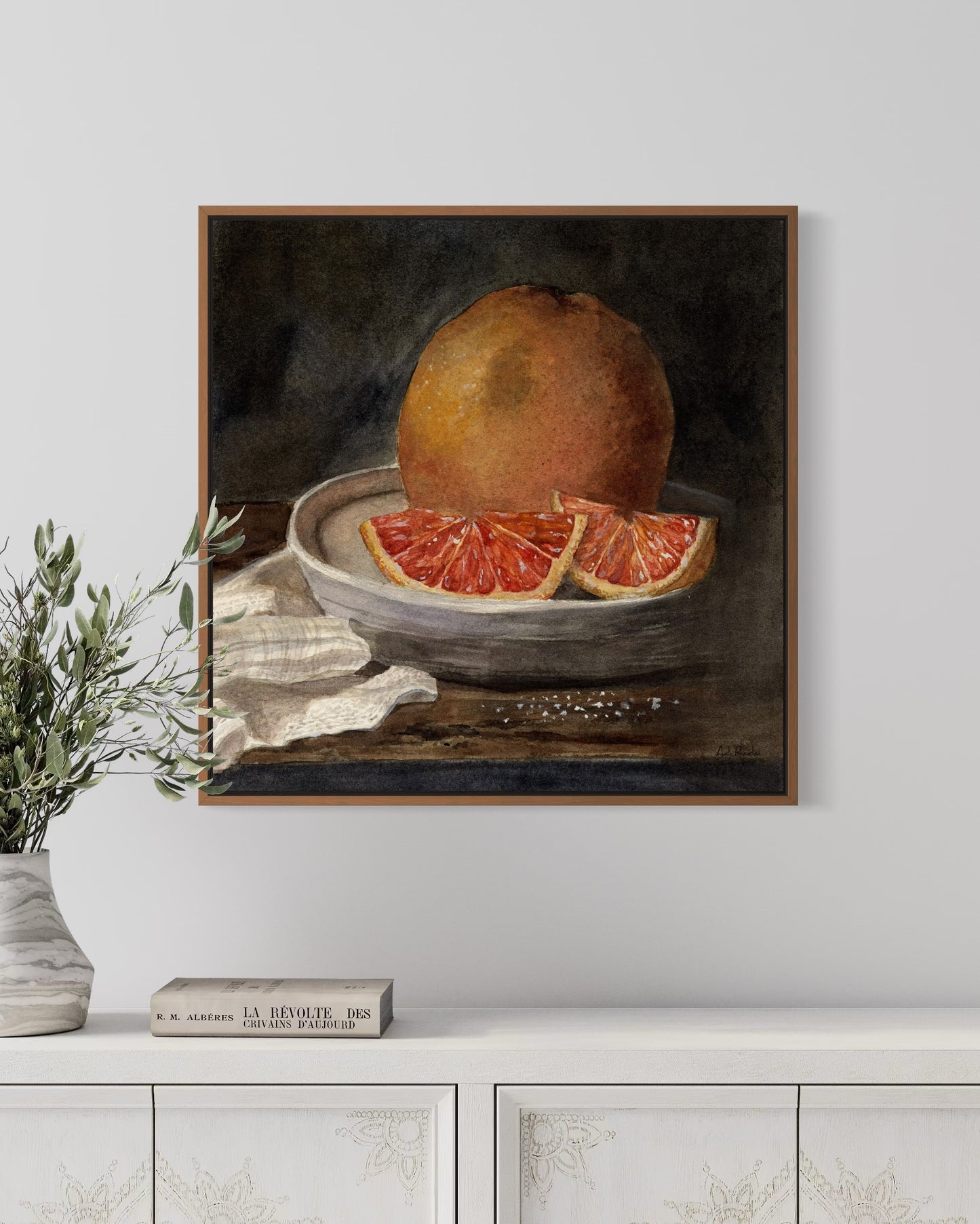 Framed art print of still life oranges on a plate. By Adi Radai. 