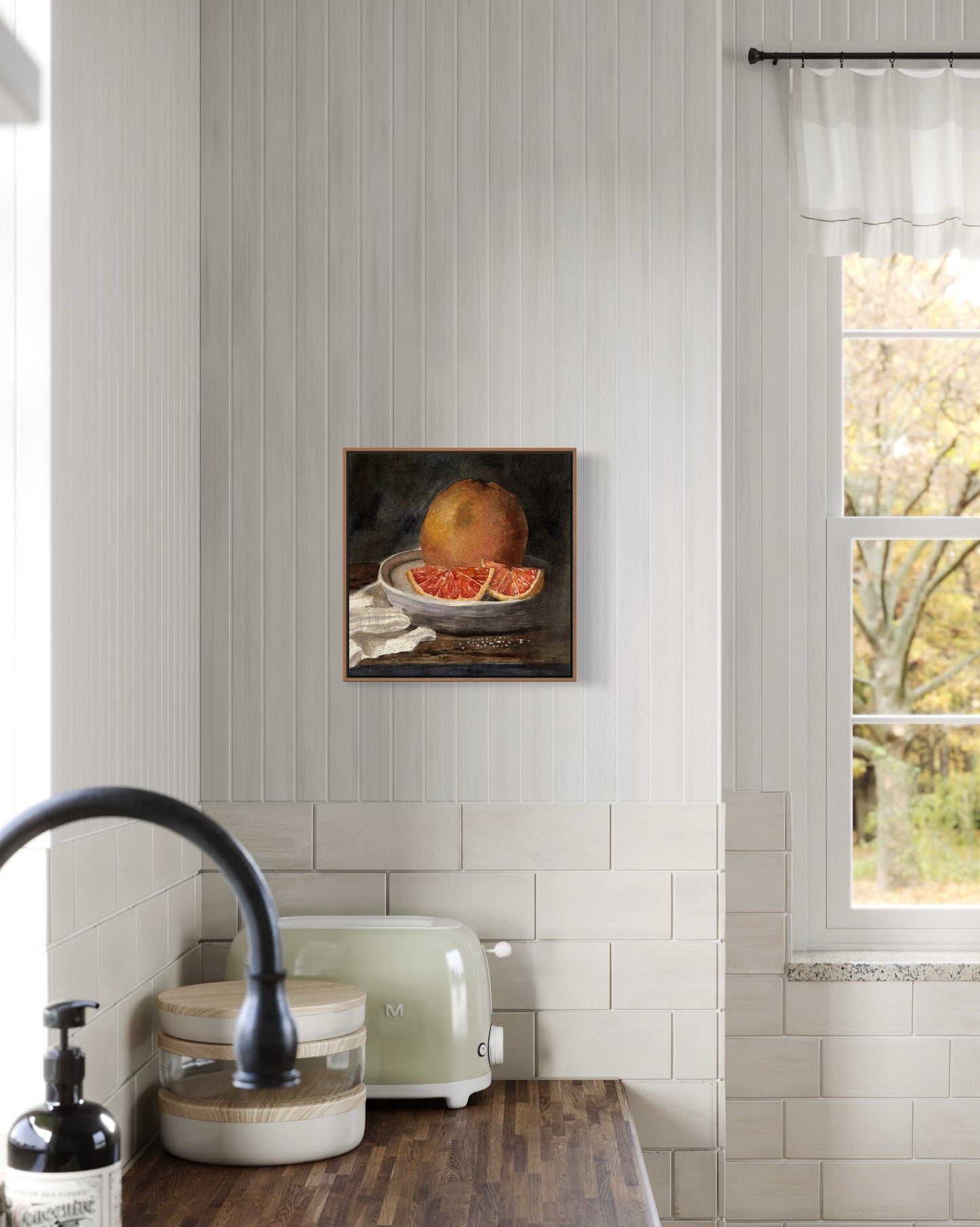 Framed art print of still life oranges on a plate. By Adi Radai. 