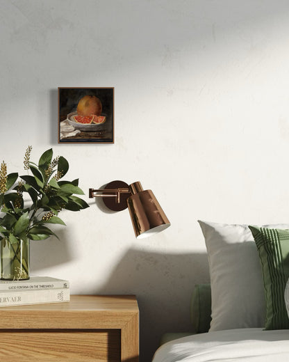 Framed art print of still life oranges on a plate. By Adi Radai. 