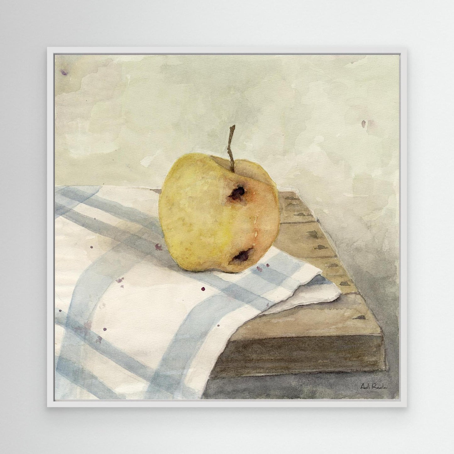 Framed art print of an apple on a table map, still life. By Adi Radai
