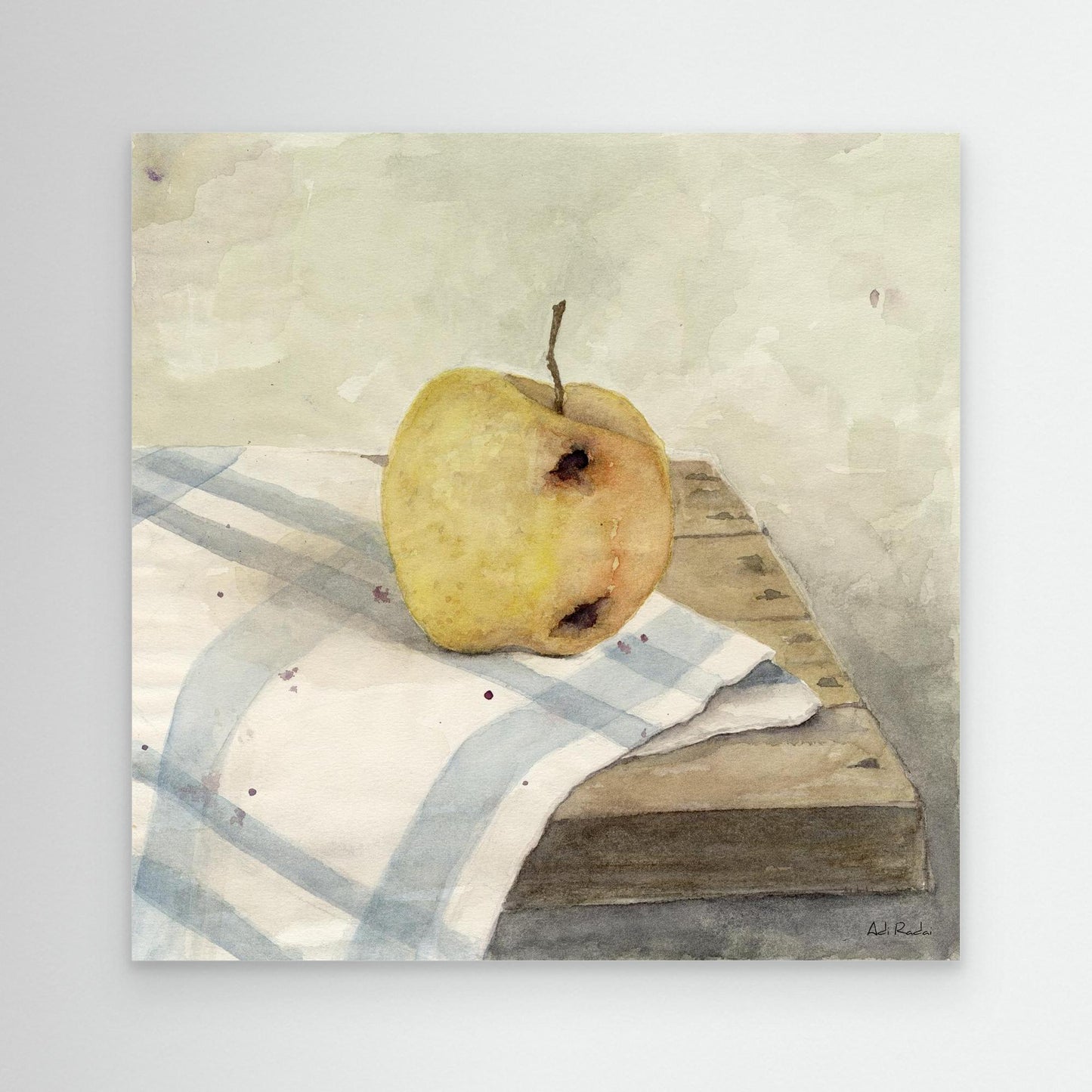 Framed art print of an apple on a table map, still life. By Adi Radai